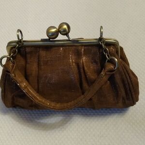 Unlisted Clutch Bag